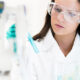 medical-lab-scientist-examines-test-tube-347x287